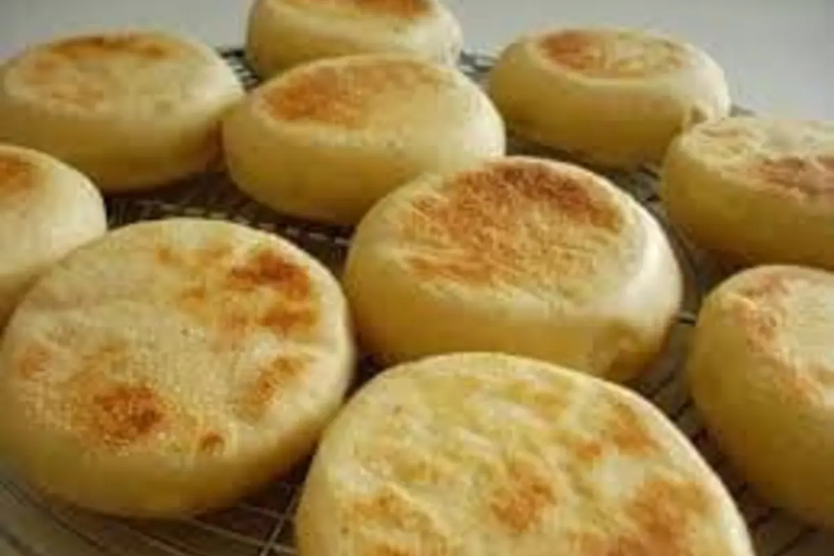 Puffy Moroccan Batbout flatbreads cooked in a skillet